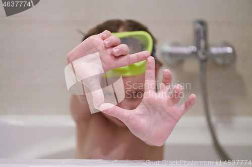 Image of little girl with snorkel goggles