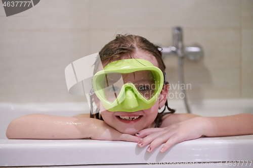 Image of little girl with snorkel goggles