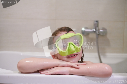 Image of little girl with snorkel goggles