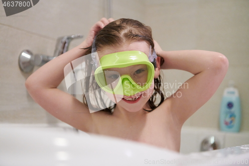 Image of little girl with snorkel goggles