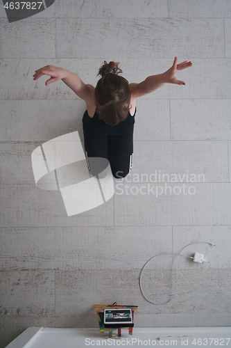 Image of girl online education ballet class at home top view