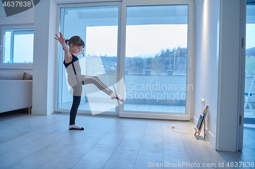 Image of girl online education ballet class at home