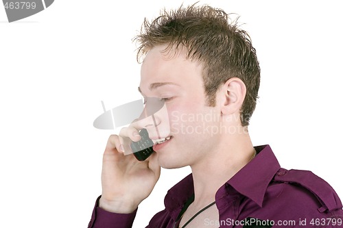 Image of portrait of the young man, speaking by phone. Isolated