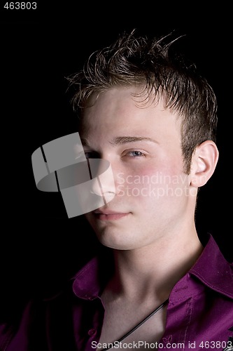 Image of portrait of the young man. Isolated on black background