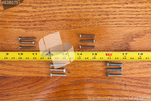 Image of Screws and a tape measure