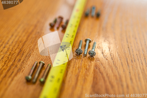 Image of Screws and a tape measure