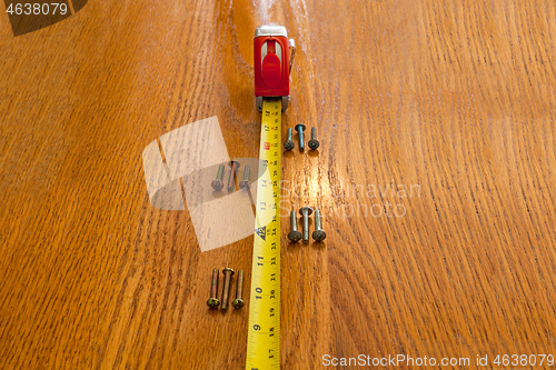 Image of Screws and a tape measure