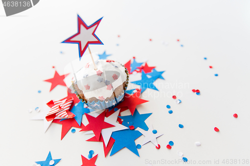 Image of cupcake with candle and stars at 4th july party