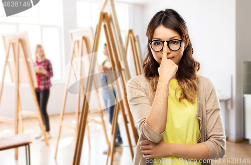 Image of asian woman in glasses or student