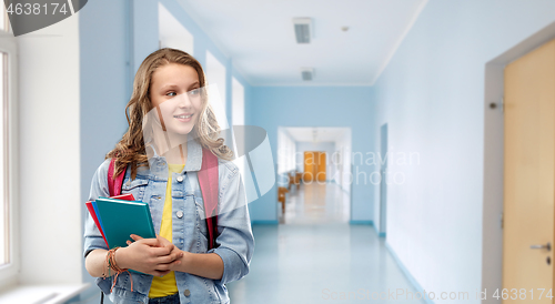 Image of happy smiling teenage student girl with school bag