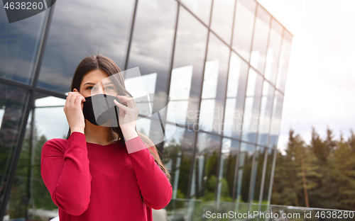 Image of business woman portrait  with protective mask