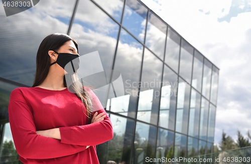 Image of business woman portrait  with protective mask