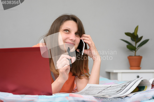 Image of The girl calls up with employers by phone