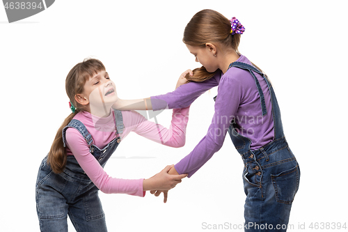 Image of Two girls fight and hurt each other