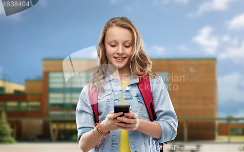 Image of teen student girl with school bag and smartphone