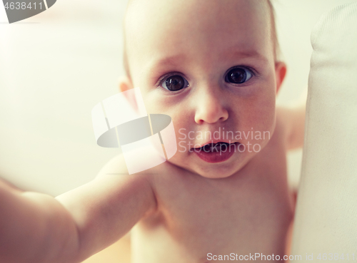 Image of close up of happy little baby boy or girl at home
