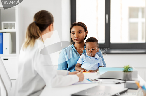 Image of mother with baby son and doctor at clinic