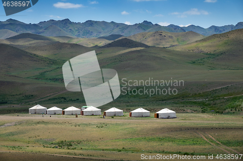 Image of Yurts between montains in Mongolia