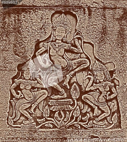 Image of Historic Khmer bas-relief with dancing Hindu goddesses