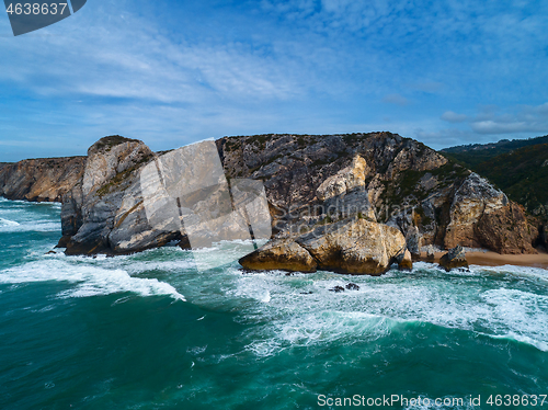 Image of Atlantic coast with rock cliffs and waves