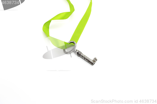 Image of Vintage silver key with green ribbon