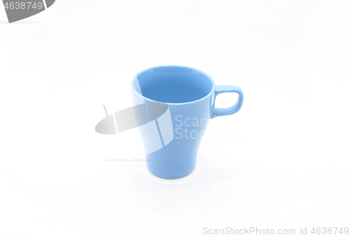 Image of Bright blue ceramic cup isolated on white