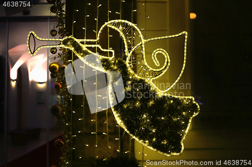 Image of Christmas glowing decoration in the form of an angel 