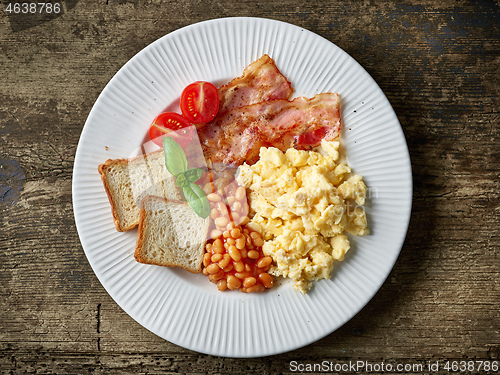 Image of breakfast plate on wooden table