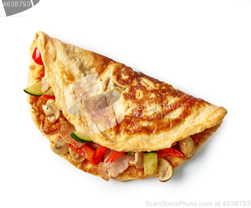 Image of omelette stuffed with vegetables and ham