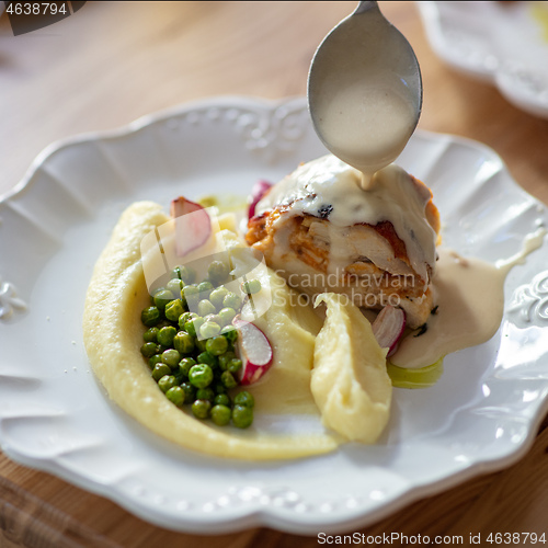 Image of mashed potatoes and roast chicken