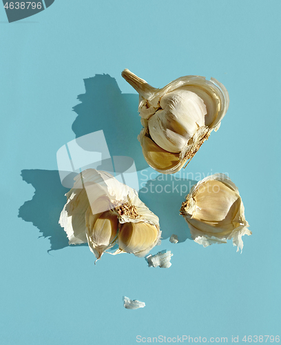 Image of garlic on blue background