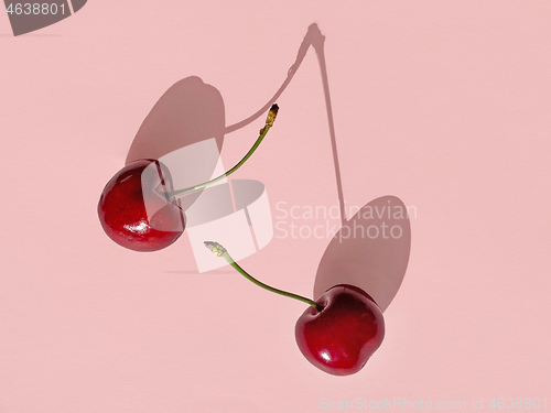 Image of fresh sweet cherries with long shadows