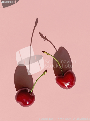 Image of fresh sweet cherries with long shadows