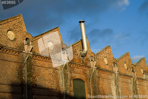 Image of Factory roof with chimney