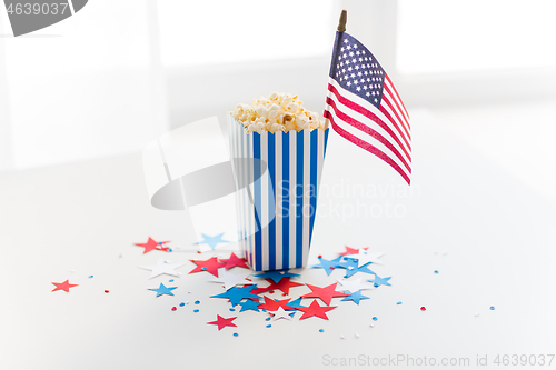 Image of flag and popcorn on american independence day