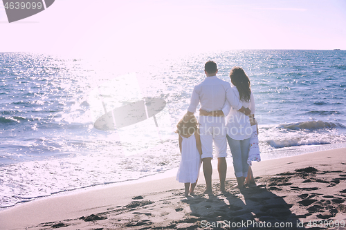 Image of happy young  family have fun on beach