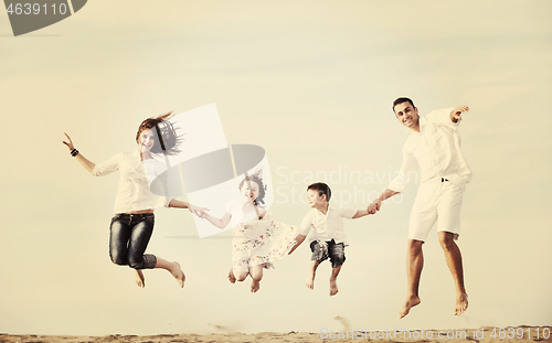 Image of happy young family have fun on beach