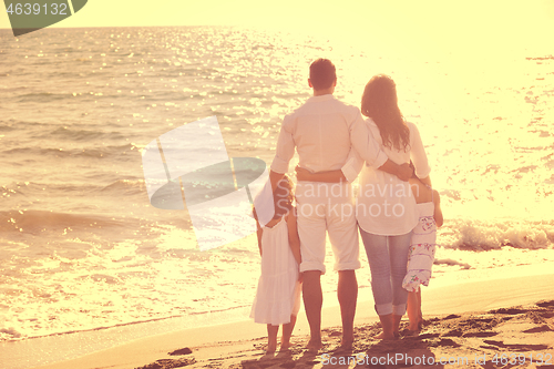 Image of happy young  family have fun on beach