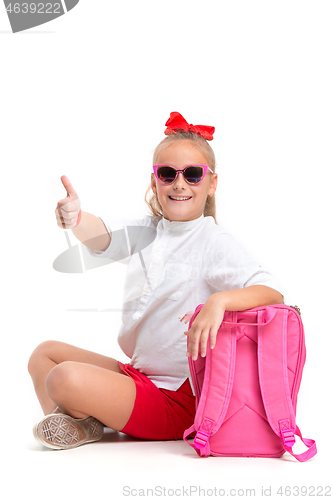 Image of Full length portrait of cute little kid in stylish sunglasses looking at camera and smiling