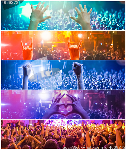 Image of Rock concert, silhouettes of happy people raising up hands