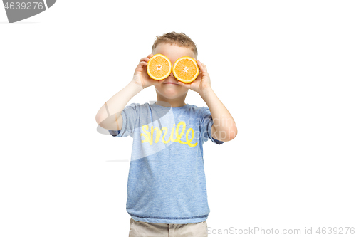 Image of Full length portrait of cute little kid in stylish clothes with orange