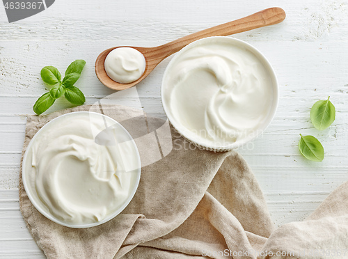 Image of bowls of sour cream or yogurt