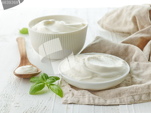 Image of bowls of sour cream or yogurt