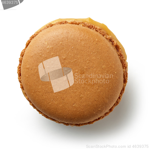 Image of caramel macaroon on a white background