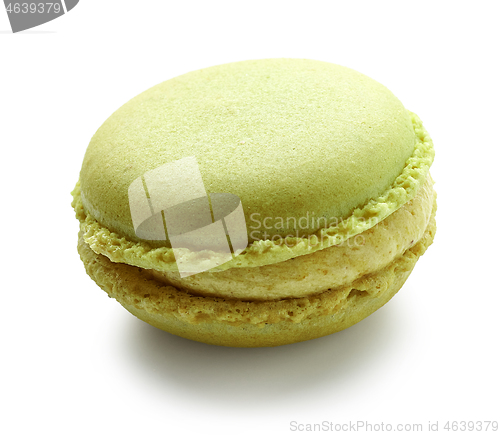 Image of pistachio macaroon on white background