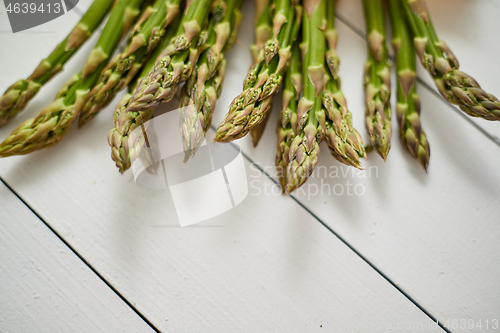 Image of Fresh green asparagus in a brown paper bag. Healthy eating concept. Food for vegetarians