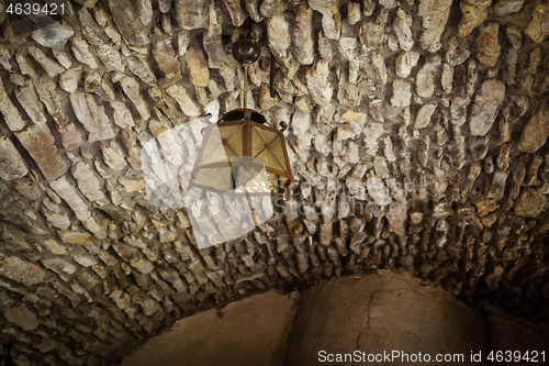 Image of Old fashioned vintage lantern lamp hanging on the ceiling