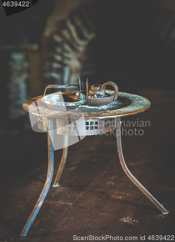 Image of Vintage rusty table with candle holders 