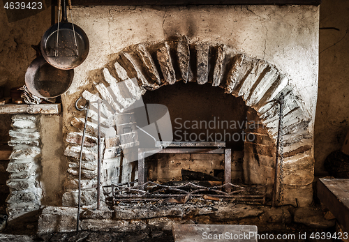 Image of Old stone fireplace in the basement