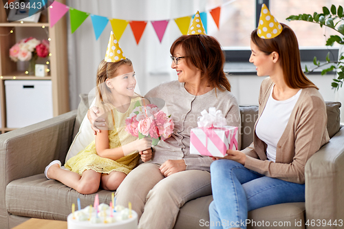 Image of granddaughter greeting grandmother on birthday